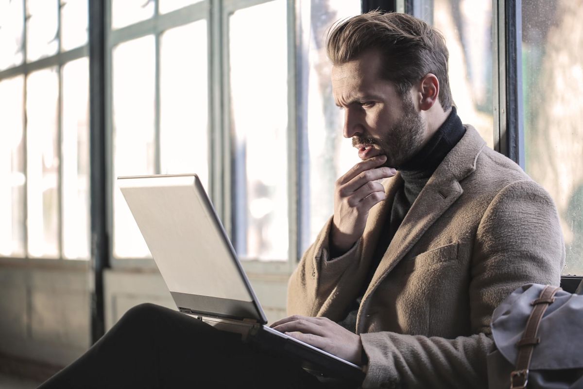 Male using laptop