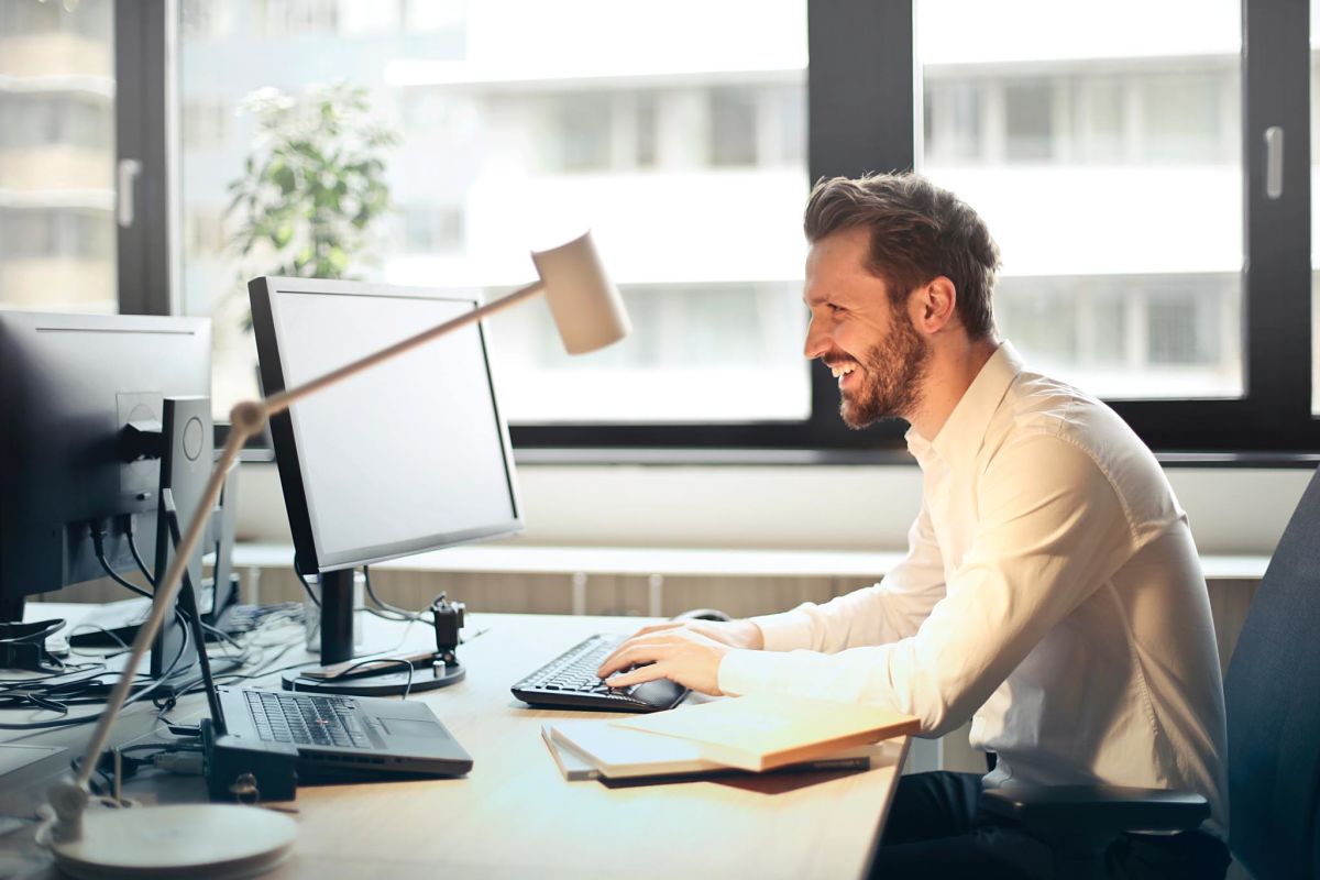 Male using computer