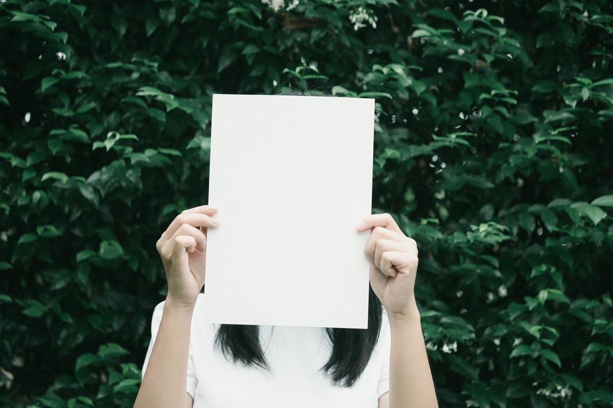 Women holding paper